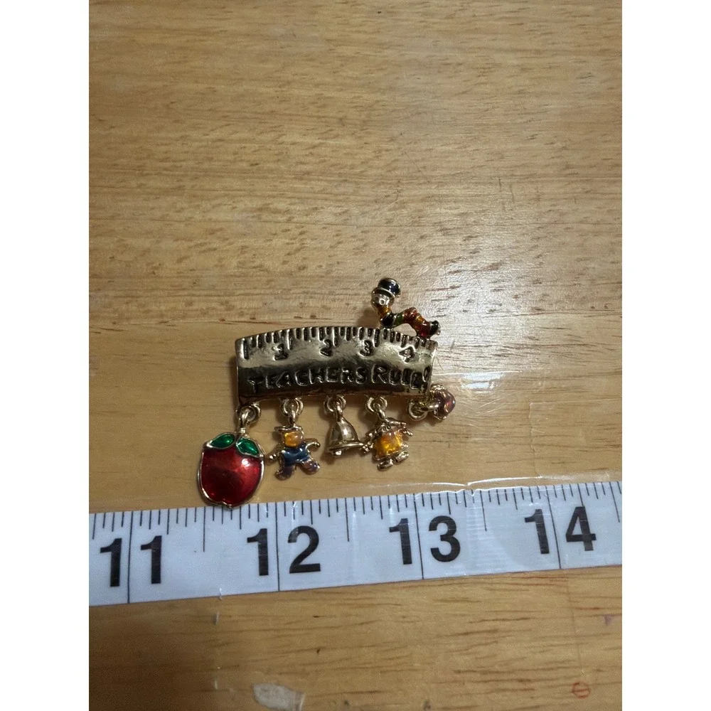 VTG Gold Tone Teachers Rule Ruler Brooch with Enamel Apple and Student Charms